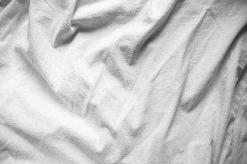 texture background cotton folds of white fabric