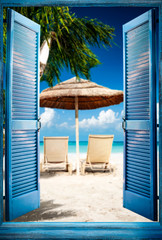 Blue wooden door and beach landscape with free space for your decoration. 