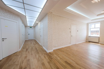 panoramic view office room made in bright colors with wooden parquet and large windows