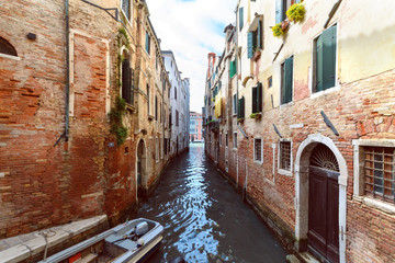 Fototapeta na wymiar Canal with boat in Venice. Italy.