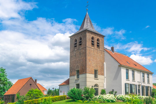 A old traditional Dutch church in the village of Ooij, Holland