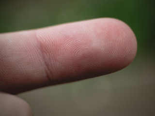 CAUCASIAN FINGER TIP CLOSE UP