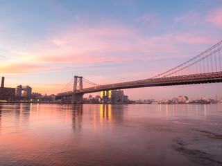 Wide Angle View of the Williamsburg Bridge During Sunrise With Clear Skies