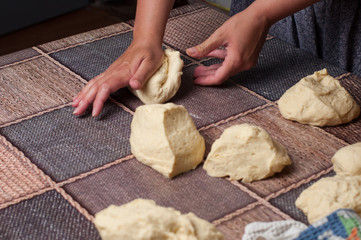 Woman making dought.Dought for pizza and bread.Food