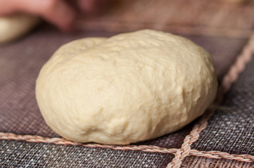 Woman making dought.Dought for pizza and bread.Food