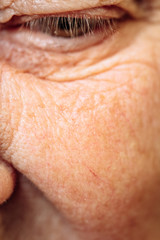 Naklejka premium Eye close up, Close-up of old woman's eye