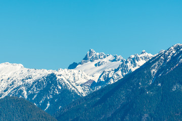 Fototapeta na wymiar Aerial view at Mountains in Winter in British Columbia, Canada