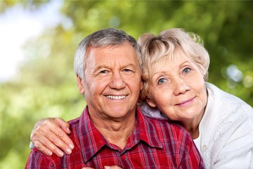 Portrait of happy senior couple smiling