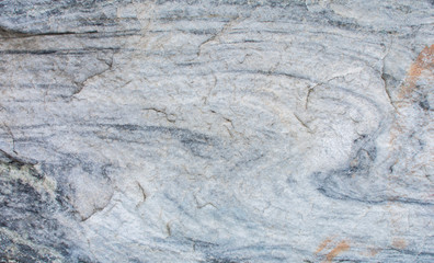 Obraz na płótnie Canvas A natural stone. Untreated marble. Texture. Background