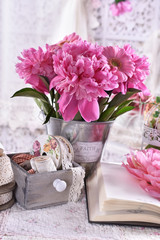 bunch of peonies in vintage style bedroom