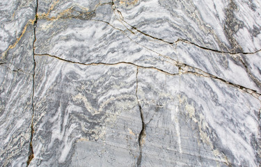 A natural stone. Untreated marble. Texture. Background