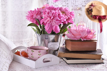 bunch of peonies in vintage style bedroom