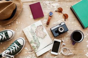 Fototapeta na wymiar Overhead view of Traveler's accessories, Essential vacation items, Travel concept background