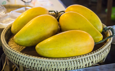 Fresh Yellow Mango Fruit in Handcraft Basket Fresh Market Concept
