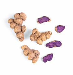 Black galingale on white background. top view