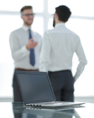 Obraz premium business background.open laptop on office Desk