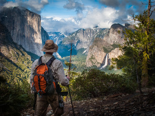 Hiker Pauses to Enjoy a View of Bridalviel Fall
