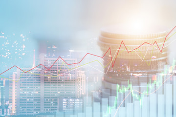 Financial investment concept, Double exposure of city night and stack of coins for finance investor, Forex trading candlestick chart economic , ECN Digital economy, business background.