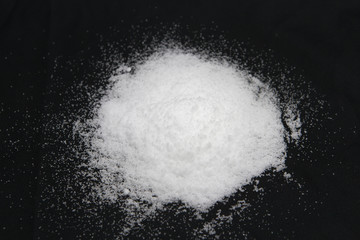 Obraz na płótnie Canvas Salt pile. White sugar powder heap vector illustration on black background 