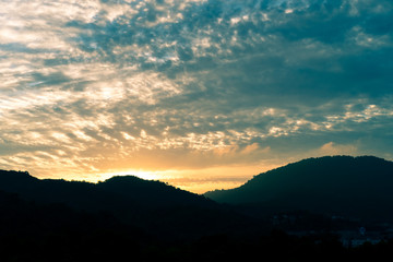 Mountain scenery view with twilight sky beautiful magenta color tone theme sunset and sunrise.