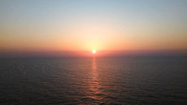 rising sun over the sea of Percian Gulf  