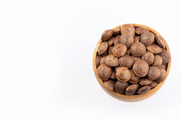 Dried seeds of sacha fruit - Inchi peanuts - Plukenetia volubilis. White background