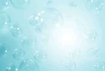 Blue soap bubbles background.