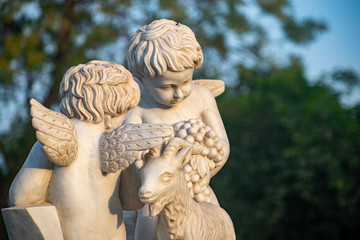 statue of angel on a background of sky