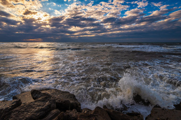 Stormy sea and rocky coast, beautiful dramatic sky