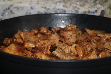 grilled meat with a Golden crust in the pan