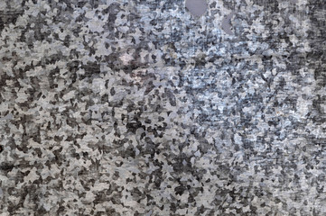 Fototapeta na wymiar metal background: a sheet of galvanized clean tin, smooth surface, short focus
