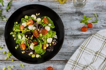 Tomato salad with cottage cheese, olive oil healthy food spring salad