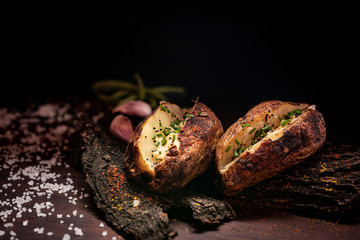 Rustic baked potatoes close up