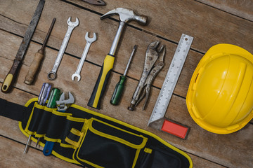 old instruments constructor or renovation for build and repair house on wooden background