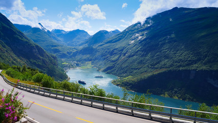 Fototapeta premium Fjord Geirangerfjord with ferry boat, Norway.