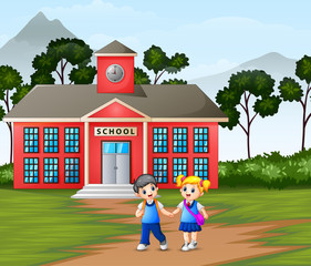 Obraz na płótnie Canvas Children walking in front of the school building