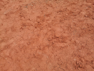 Clay Open Quarry Mars Landscape with red Water.  stone Texture. Erosion Crack Hill Desert Surface