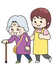 高齢女性に歩行介助を行う介護士の女性