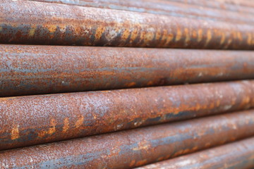 background of rusty pipes in stock yard
