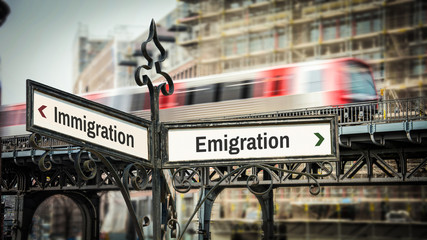 Street Sign Emigration versus Immigration
