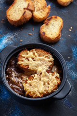Delicious onion soup with croutons and cheese