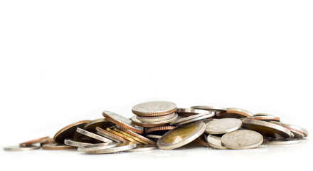 Pile of coins on white background. selective focus. Saving coins money concept - Powered by Adobe