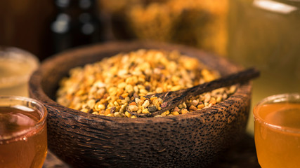Honey Bee Pollen in Wooden Bowl, Close Up