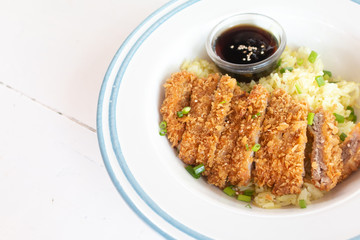 Deep fried breaded pork Topped on rice with sesami, Japanese food call 