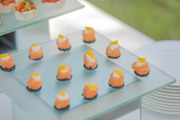 Catering fish and cheese snacks for a birthday or wedding.