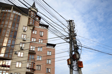 An example of how you can not build Internet connections. Web of wires on the city post. Uncovered...