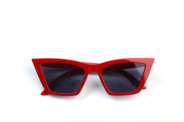 red modern sunglasses isolated on white background .