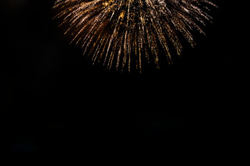 Awesome isolated Festive fireworks on a dark background. Can be used as wallpaper or background