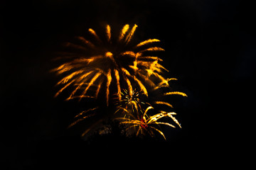 Awesome isolated Festive fireworks on a dark background. Can be used as wallpaper or background