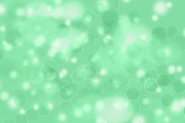 Green and yellow blurred abstract background with magic lights